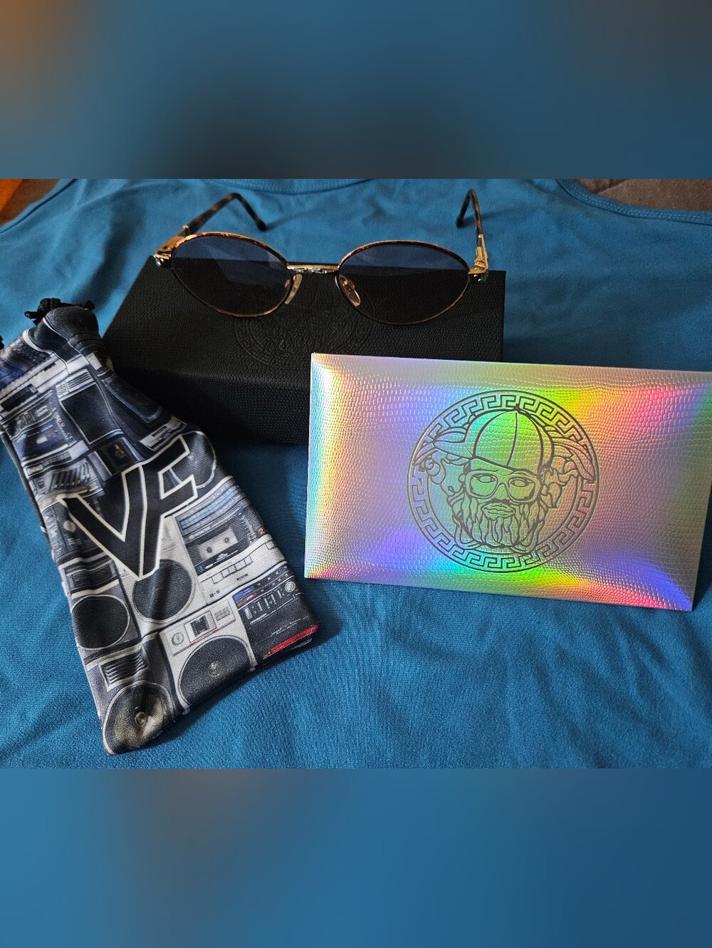 Carolina Herrera Gold Metal Frame Sunglasses with Black Lenses